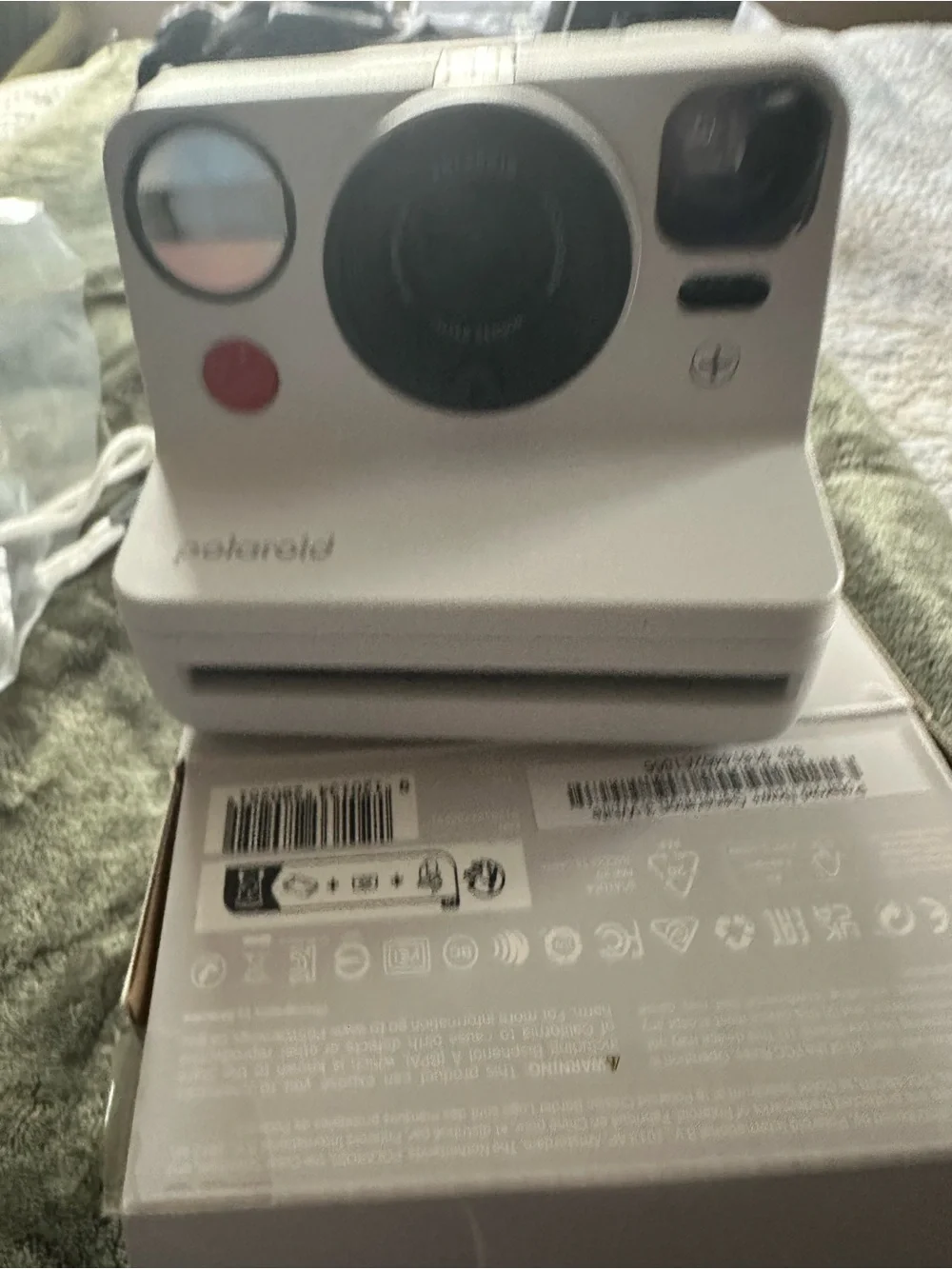 NEW IN BOX. Polaroid White Instant Camera with Rainbow Accent. NEVER USED.